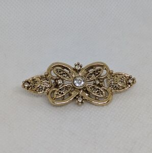 Goldtone Filigree Brooch Cĺear Rhinestones 2" Long Pin Formal Whimsical
